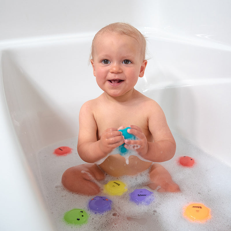 baby in the bath with water squirters