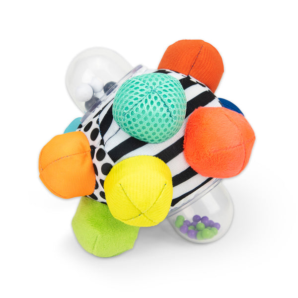 a baby ball with soft fabric nodes and rattles all in bright colours