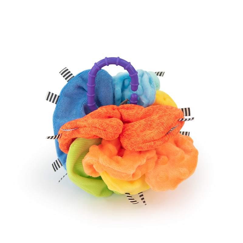 coloured scrunch fabric on a ring for baby sensory play