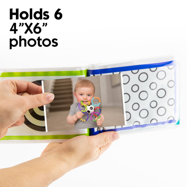 a baby book that also holds photos inside 