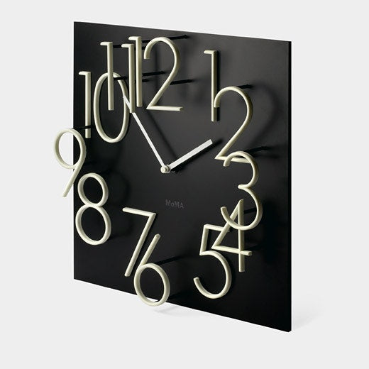 Moma - Glow in the dark Clock in black